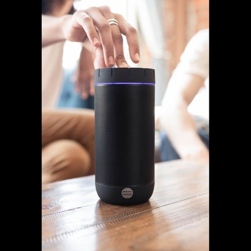 Portable Bluetooth speaker with purple LED ring, perfect for van life and outdoor adventures