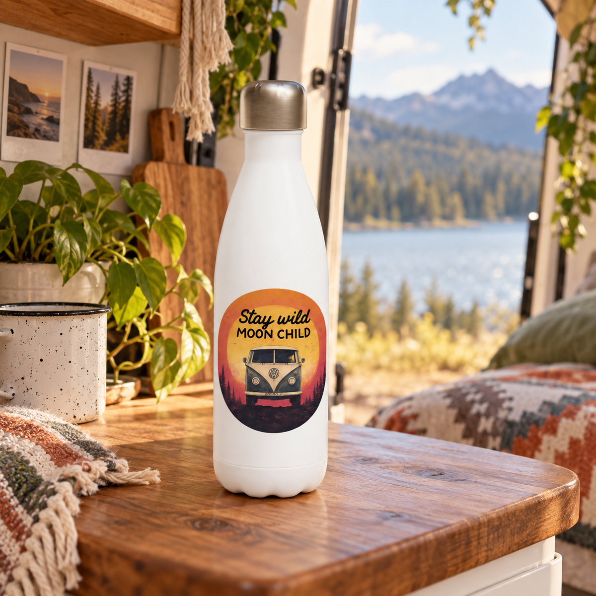 Stay Wild Water Bottle in a van-life setting