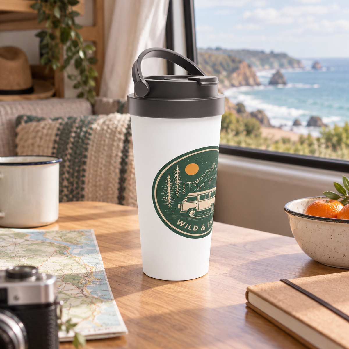 Wild & Free Travel Mug in a van-life setting