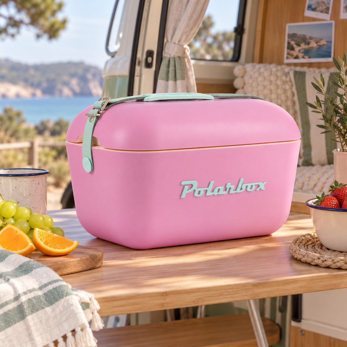 Polarbox Pink 12L Cool Box in a van-life setting