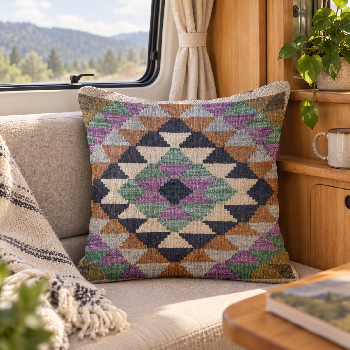 Afghan Kilim Cushion in a van-life setting