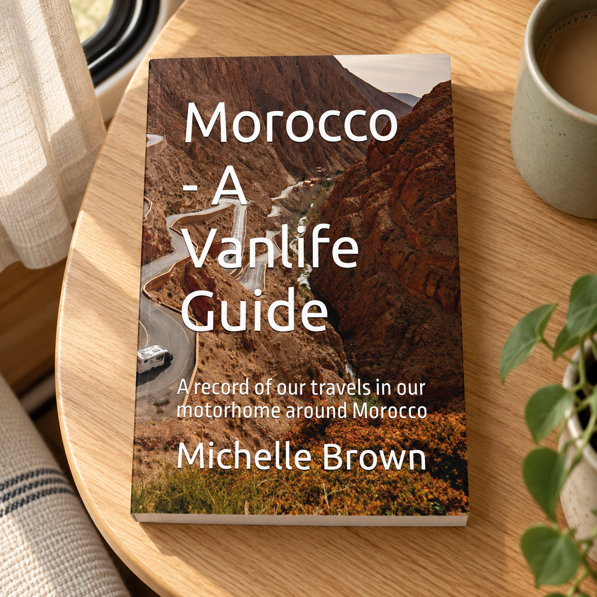 Morocco – A Vanlife Guide – book on a wooden campervan table