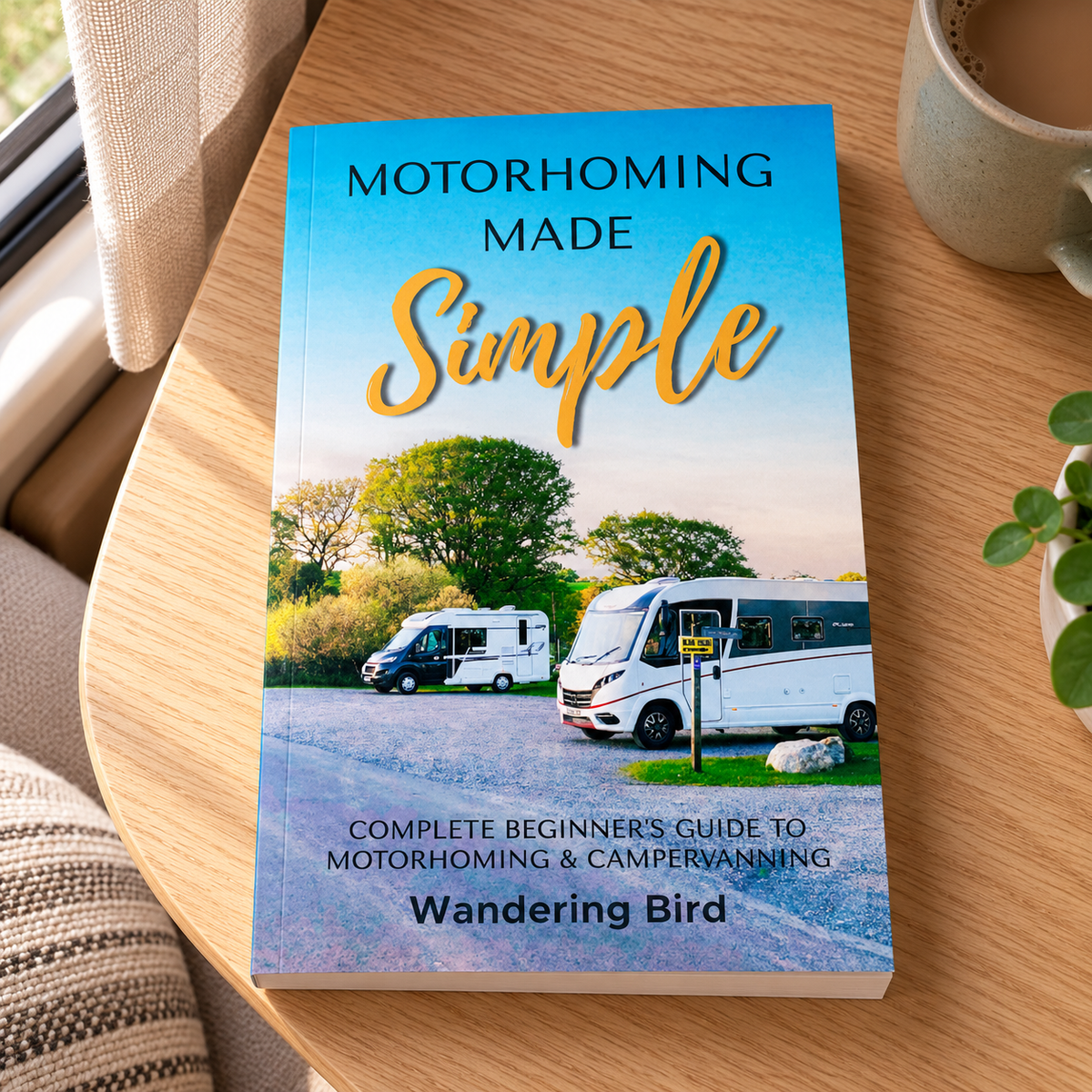 Motorhoming Made Simple: A Beginner's Guide – book on a wooden campervan table