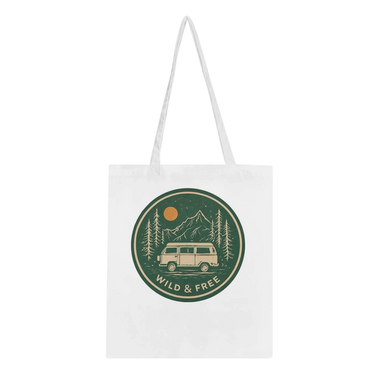 White tote bag with 'Wild & Free' van life design, featuring camper van, mountains, and trees for outdoor adventures.