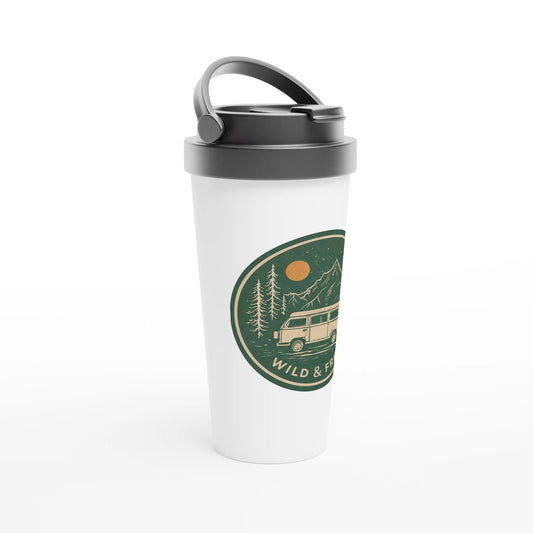 White travel mug with van life design, mountains, trees, and 'Wild & Free' text — perfect for campers and adventurers.